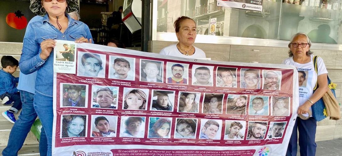 Colectivos pegan fotografías de desaparecidos por Jornada Nacional de Búsqueda